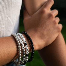 Load image into Gallery viewer, Gloria Steinem We Are Linked Not Ranked Bracelet (Black)
