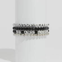 Load and play video in Gallery viewer, Gloria Steinem We Are Linked Not Ranked Bracelet (Black)
